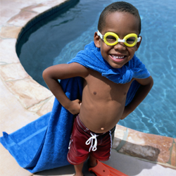 Boy with hemophilia near a pool