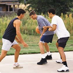 Wearing proper shoes while playing basketball