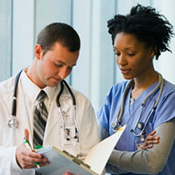 Doctors looking at chart