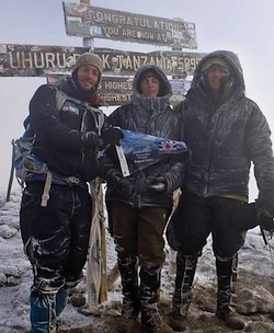 Jeff Salantai (left), Alex Hill and Eric Hill on the summit of Mt. Kilimanjaro i