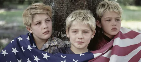 The Ray brothers with the American flag